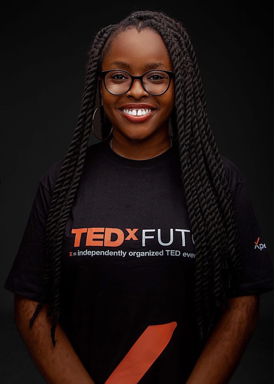 Nmesoma Diva Oloto in a TEDxFUTO team shirt